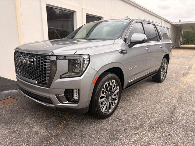 2024 GMC Yukon Denali Ultimate in Sterling Metallic — front three-quarter view